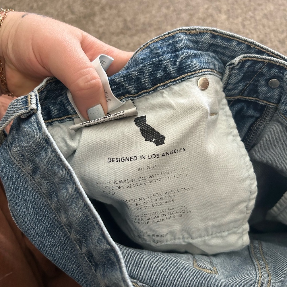 AG Adriano Goldschmied | Medium Wash Distressed Hem Becke Relaxed Slim Short - Picture 8 of 10